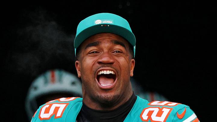 Miami Dolphins linebacker Tyrel Dodson runs on the field