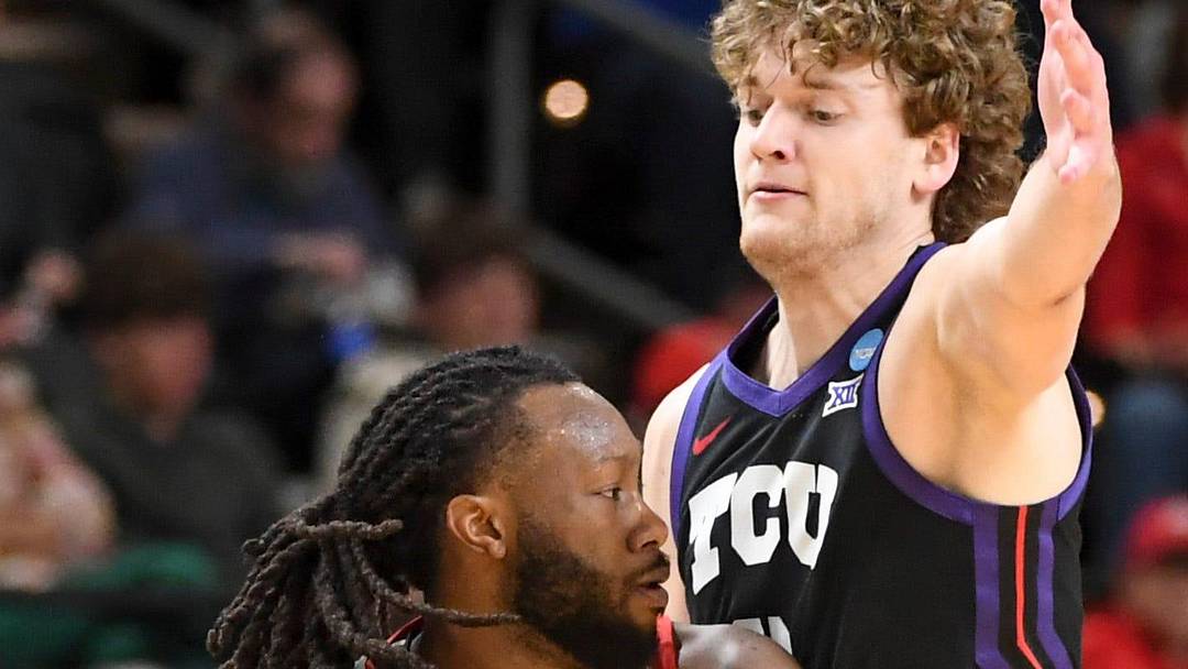 Ohio State Buckeyes guard Bruce Thornton (2) is defended by TCU Horned Frogs guard Liutauras Lelevicius (3) Thursday, March 19, 2026, during the NCAA Men’s Basketball Tournament first round game at Bon Secours Wellness Arena in Greenville, South Carolina.