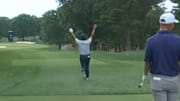 Si Woo Kim celebrates making a hole in one at the PGA Championship.