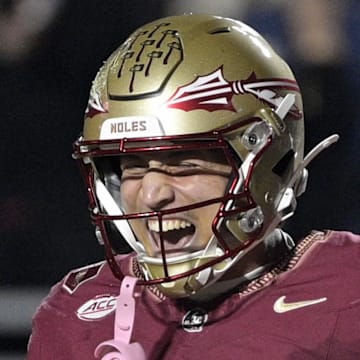 Nov 1, 2025; Tallahassee, Florida, USA; Florida State Seminoles quarterback Tommy Castellanos (1) celebrates a touchdown with wide receiver Duce Robinson (0) during the second half against the Wake Forest Demon Deacons at Doak S. Campbell Stadium. Mandatory Credit: Melina Myers-Imagn Images