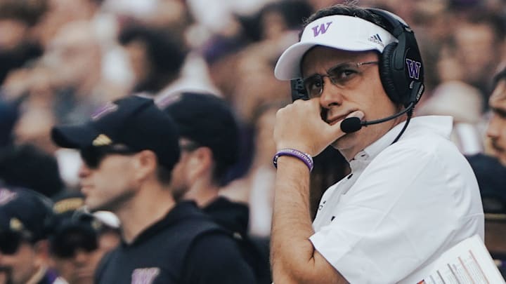 Jedd Fisch is caught in a pensive moment during the Eastern Michigan game. 