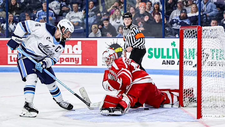 Brandon Holt scores 43 seconds into overtime as Maine men's ice hockey team earned a 5-4 win over Boston University on Oct. 31, 2015, at Alfond Arena.
