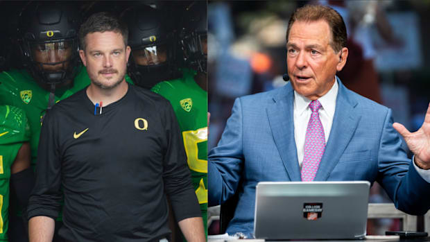 Oregon Ducks coach Dan Lanning and former Alabama coach nick Saban