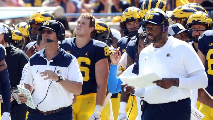 Michigan Wolverines head coach Jim Harbaugh and co-offensive coordinator Sherrone Moore, right, during the 51-7 win against the Colorado State Rams, Saturday, Sept. 3, 2022.

Michigan