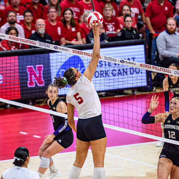 Rebekah Allick (5) gets the first point of the match with a kill. 