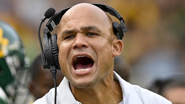Sep 3, 2022; Waco, Texas, USA; Baylor Bears head coach Dave Aranda cheers for this team during the first quarter against the Albany Great Danes at McLane Stadium. Mandatory Credit: Jerome Miron-Imagn Images