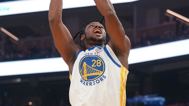 Apr 5, 2026; San Francisco, California, USA; Golden State Warriors center Charles Bassey (28) makes a shot between Houston Rockets center Clint Capela (30) and forward Tari Eason (17) in the first quarter at the Chase Center. Mandatory Credit: Cary Edmondson-Imagn Images