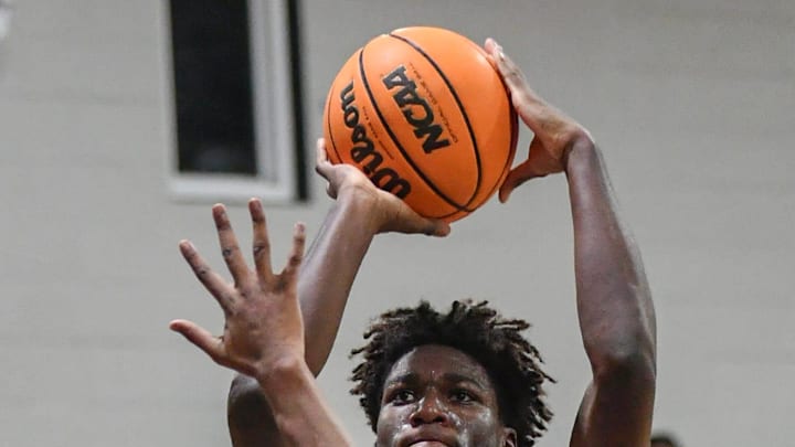 Zeke Aime of Palm Bay shoots over Rockledge defender Kiori Jordan-Thomas in the championship game of the Cape Coast Conference basketball tournament Monday, January 22, 2024. Craig Bailey/FLORIDA TODAY via USA TODAY NETWORK