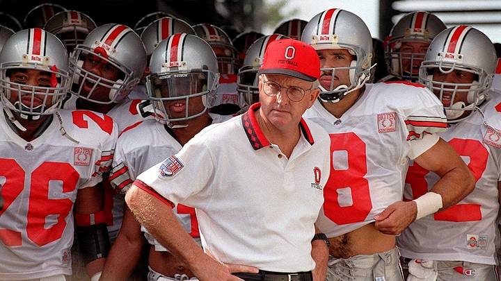Coach John Cooper waits with the Ohio State football team before taking field before the start of a game against Penn State in 1995.