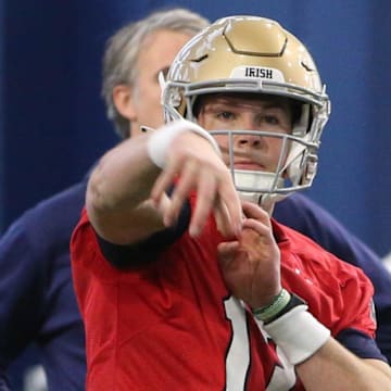 Notre Dame quarterback Riley Leonard (13) passes at Notre Dame spring football practice Thursday, March 7, 2024, at the Irish Athletics Center in South Bend.