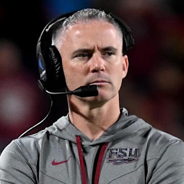 Dec 29, 2022; Orlando, Florida, USA; Florida State Seminoles head coach Mike Norvell looks on in the second half against the Oklahoma Sooners in the 2022 Cheez-It Bowl at Camping World Stadium. Mandatory Credit: Jonathan Dyer-Imagn Images