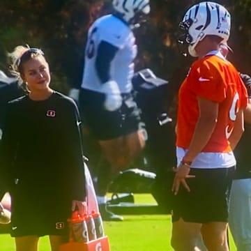Former Bengals athletic trainer Whitney Desotell listens to Joe Burrow talk about fossils on the Netflix documentary "Quarterback."