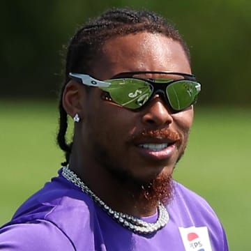 Vikings receiver Justin Jefferson will be re-evaluated again for a mild hamstring strain.