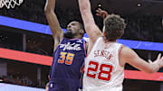 Feb 23, 2024; Houston, Texas, USA; Phoenix Suns forward Kevin Durant (35) shoots the ball as Houston Rockets center Alperen Sengun (28) defends during the third quarter at Toyota Center. Mandatory Credit: Troy Taormina-Imagn Images