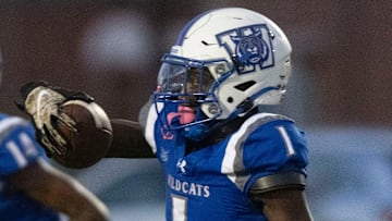 Washington wide receiver Gionni Lewis (No. 1) takes to the open field on a run against Fort Walton on Thursday, Sept. 12, 2024.