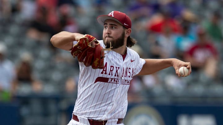 Arkansas Razorbacks' Zach Root (33) pitches as Arkansas Razorbacks take on Ole Miss Rebels during the SEC baseball tournament at Hoover Met in Birmingham, Ala., on Friday, May 23, 2025.