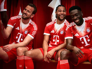 Harry Kane, Serge Gnabry, and Alphonso Davies in Bayern's new home kit.