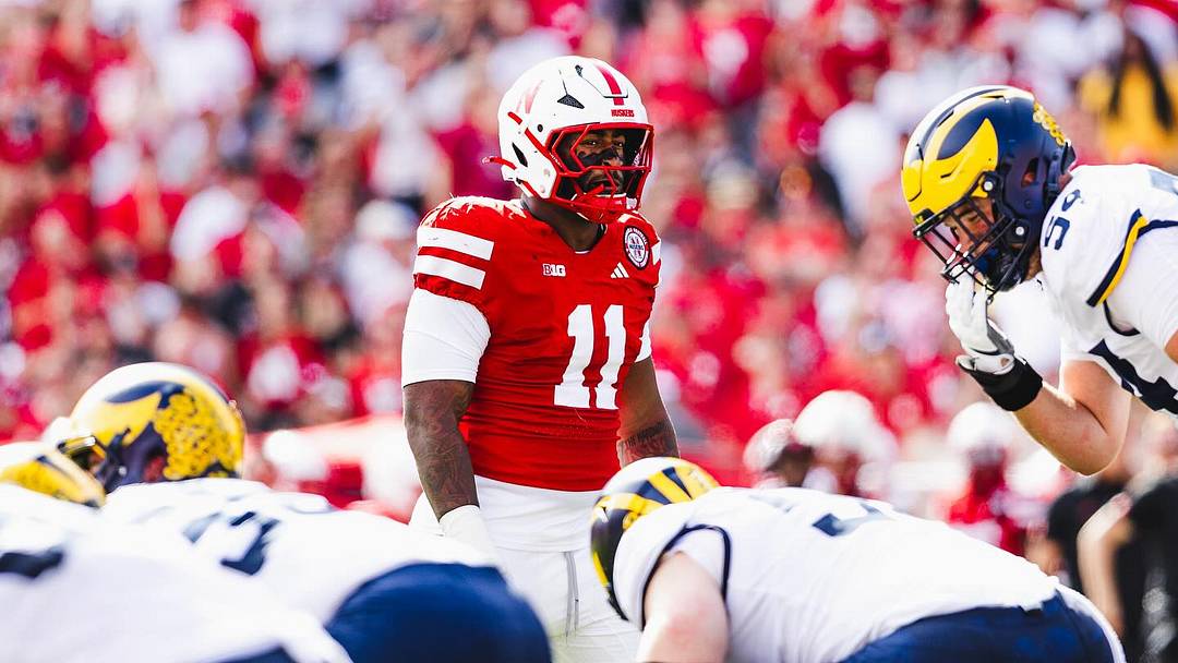 Cam Lenhardt prepares for the snap against the Michigan Wolverines. 