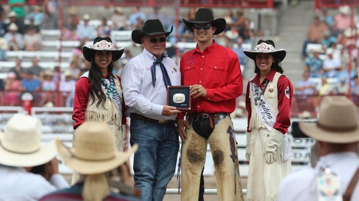 Logan Cook was all smiles after winning the Cheyenne Frontier Days Rodeo with a 90-point ride during Sunday's short-go. 