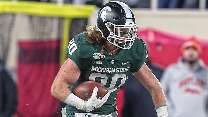 Nov 30, 2019; East Lansing, MI, USA; Michigan State Spartans tight end Matt Seybert (80) runs for yards after a catch against the Maryland Terrapins during the second half a game at Spartan Stadium. Mandatory Credit: Mike Carter-USA TODAY Sports