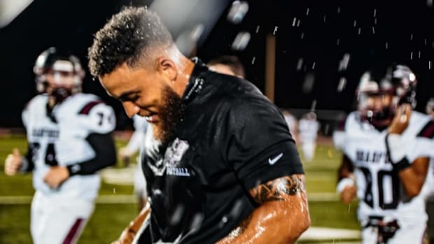 Wisconsin high school football: Kenosha Bradford's Steve Morris celebrates his first victory as head coach on Aug. 23, 2025