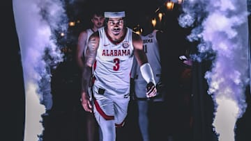 Latrell Wrightsell Jr. leads Alabama onto the court at MGM Grand Garden Arena in Las Vegas.
