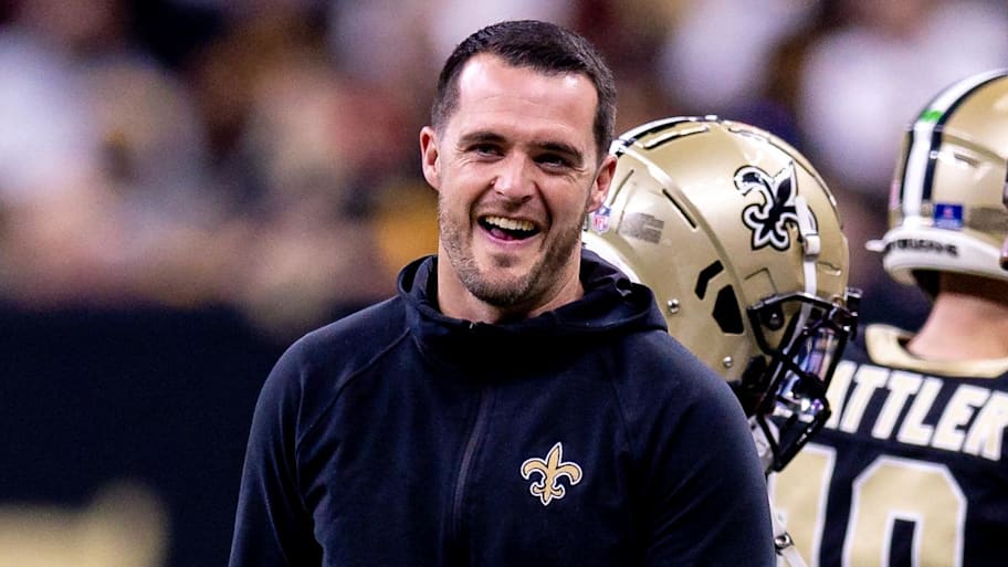 New Orleans Saints quarterback Derek Carr reacts to a play while on the sidelines. | Stephen Lew-Imagn Images
