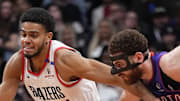 Portland Trail Blazers guard Rayan Rupert fights to get past Toronto Raptors forward Jamison Battle.