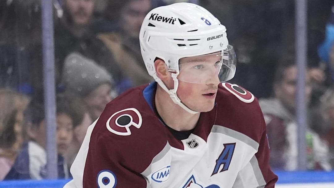Jan 25, 2026; Toronto, Ontario, CAN; Colorado Avalanche defenseman Cale Makar (8) carries the puck against the Toronto Maple Leafs during the first period at Scotiabank Arena. Mandatory Credit: John E. Sokolowski-Imagn Images