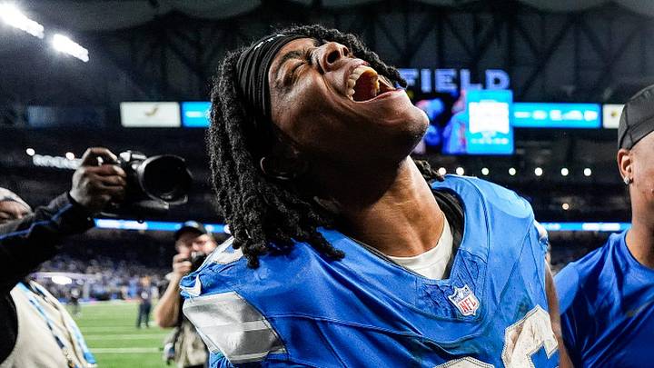 Detroit Lions running back Jahmyr Gibbs (26) and running back David Montgomery (5) celebrate 34-31 win over Green Bay Packers as he exits the field at Ford Field in Detroit on Thursday, Dec. 5, 2024.