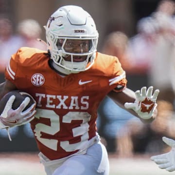 Texas Longhorns running back Jaydon Blue suffered an apparent leg injury in Saturday's game against the Michigan Wolverines.