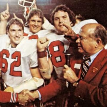 Indiana Lee Corso and some of the 1979 Hoosiers accept the Holiday Bowl trophy after the Hoosiers defeated Brigham Young 38-37. To this day, it's Indiana's only win inside the state of California.