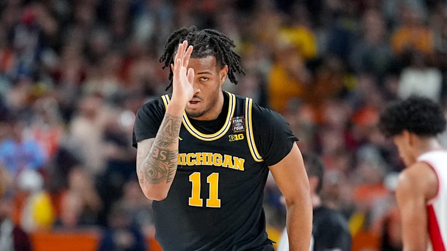 Michigan Wolverines guard Roddy Gayle Jr. makes a gesture during a Final Four game against the Arizona Wildcats.