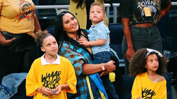 Ayesha Curry with her children after winning game five of the 2022 Western Conference Finals against the Dallas Mavericks at Chase Center.