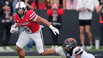 Texas Tech's Cameron Dickey runs the ball against Oklahoma State in a Big 12 football game Saturday, Oct. 25, 2025, at Jones AT&T Stadium.