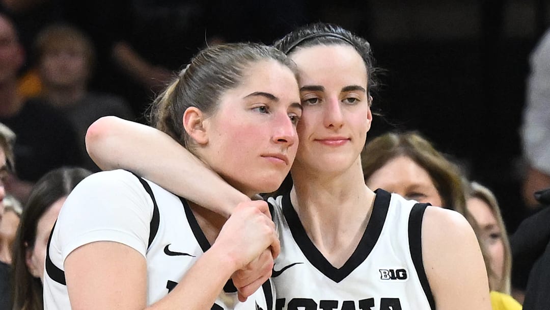 Iowa guard Kate Martin (20) and Iowa guard Caitlin Clark (22) on February 3, 2024.