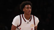 McDonald's All American West guard Alijah Arenas dribbles the ball.