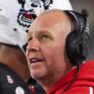 Nov 21, 2024; Atlanta, Georgia, USA; North Carolina State Wolfpack head coach Dave Doeren on the sideline against the Georgia Tech Yellow Jackets in the fourth quarter at Bobby Dodd Stadium at Hyundai Field. Mandatory Credit: Brett Davis-Imagn Images