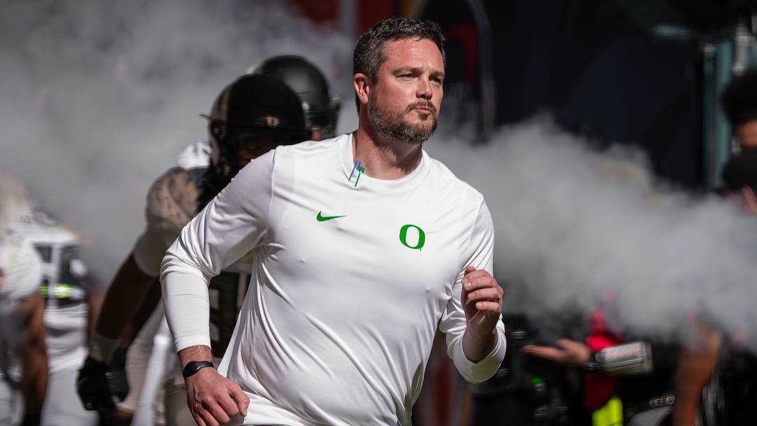 Jan. 9, 2026; Oregon head coach Dan Lanning leads the Ducks onto the field at the Peach Bowl verus the Indiana Hoosiers Jan. 9, 2026; Oregon head coach Dan Lanning leads the Ducks onto the field at the Peach Bowl verus the Indiana Hoosiers