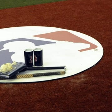 Apr 1, 2016; Montreal, Quebec, CAN; MLB logo on the on-deck circle during the game between the Boston Red Sox and the Toronto Blue Jays at Olympic Stadium. Mandatory Credit: Eric Bolte-USA TODAY Sports