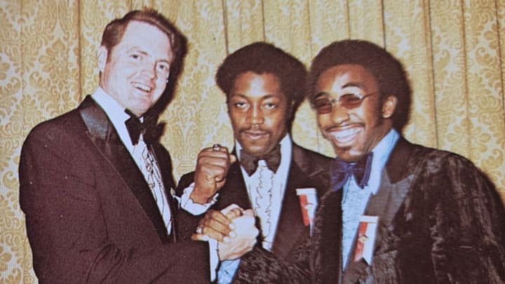 Tom Osborne, Rich Glover and Johnny Rodgers at the 1972 Heisman Trophy ceremony. Rodgers won the trophy and Glover finished third in the voting.