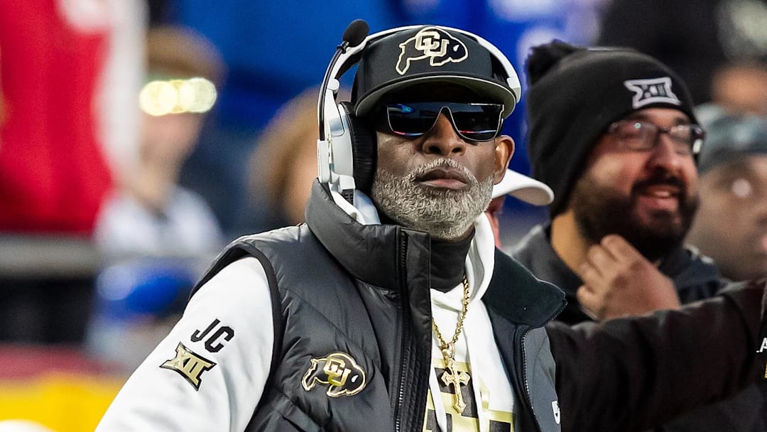 Nov 23, 2024; Kansas City, Missouri, USA;  Colorado head coach Deion Sanders watches the run of play during the 3rd quarter between the Kansas Jayhawks and the Colorado Buffaloes at GEHA Field at Arrowhead Stadium.