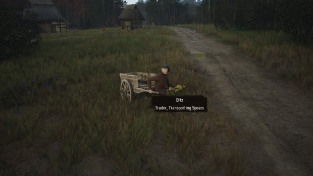 Manor Lords screenshot showing a villager pull a trading cart.