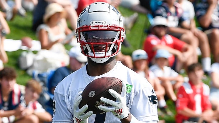 Jul 26, 2023; Foxborough, MA, USA; New England Patriots wide receiver JuJu Smith-Schuster (7) runs after the catch during training camp  at Gillette Stadium. Mandatory Credit: Eric Canha-USA TODAY Sports