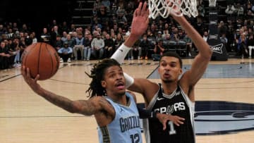 Jan 2, 2024; Memphis, Tennessee, USA; Memphis Grizzlies guard Ja Morant (12) drives to the basket as