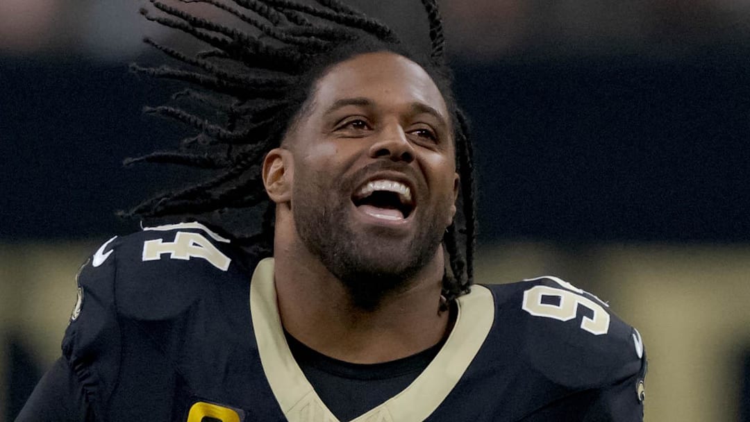 Dec 29, 2024; New Orleans, Louisiana, USA; New Orleans Saints defensive end Cameron Jordan (94) does the “Who Dat?” chant before a game against the Las Vegas Raiders at Caesars Superdome. Mandatory Credit: Matthew Hinton-Imagn Images Dec 29, 2024; New Orleans, Louisiana, USA; New Orleans Saints defensive end Cameron Jordan (94) does the “Who Dat?” chant before a game against the Las Vegas Raiders at Caesars Superdome. Mandatory Credit: Matthew Hinton-Imagn Images