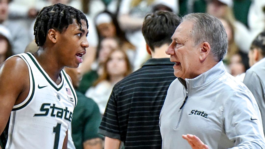 Michigan State's head coach Tom Izzo, right, talks with Jeremy Fears Jr. during the first half in the game against Maryland on Saturday, Jan. 24, 2026, at the Breslin Center in East Lansing.