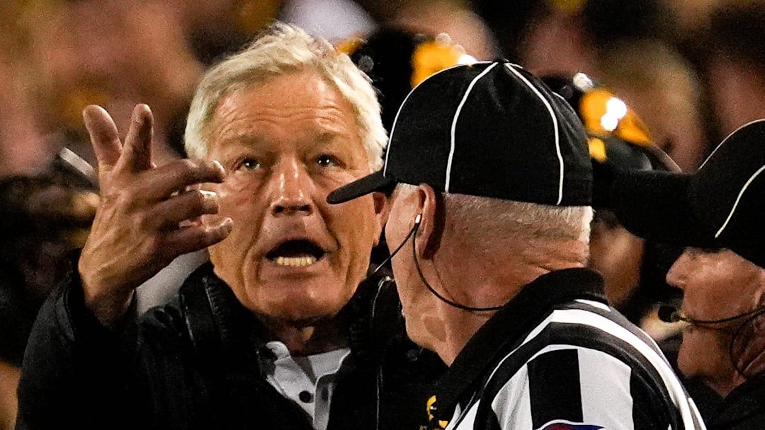 Iowa Hawkeyes head coach Kirk Ferentz talks to a referee during a college football game Oct. 18, 2025 at Kinnick Stadium in Iowa City, Iowa. Iowa Hawkeyes head coach Kirk Ferentz talks to a referee during a college football game Oct. 18, 2025 at Kinnick Stadium in Iowa City, Iowa.