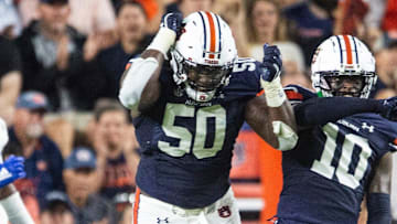 Auburn Tigers defensive lineman Marcus Harris (50) celebrates after making a goal line stand as Auburn Tigers take on San Jose State Spartans at Jordan-Hare Stadium in Auburn, Ala., on Saturday, Sept. 10, 2022. San Jose State Spartans lead Auburn Tigers 10-7 at halftime.