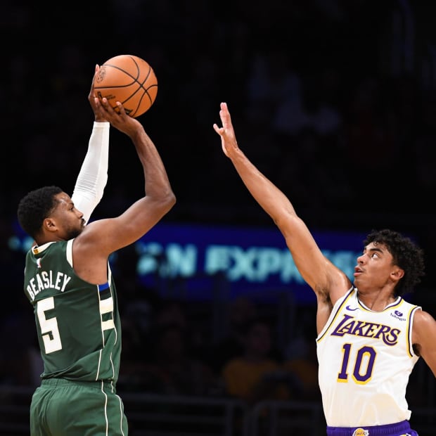 Oct 15, 2023; Los Angeles, California, USA; Milwaukee Bucks guard Malik Beasley (5) shoots against Los Angeles Lakers guard Max Christie (10) in the second quarter at Crypto.com Arena. Mandatory Credit: Jonathan Hui-USA TODAY Sports